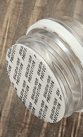 White Bottle with Pressure Sensitive Screw Cap